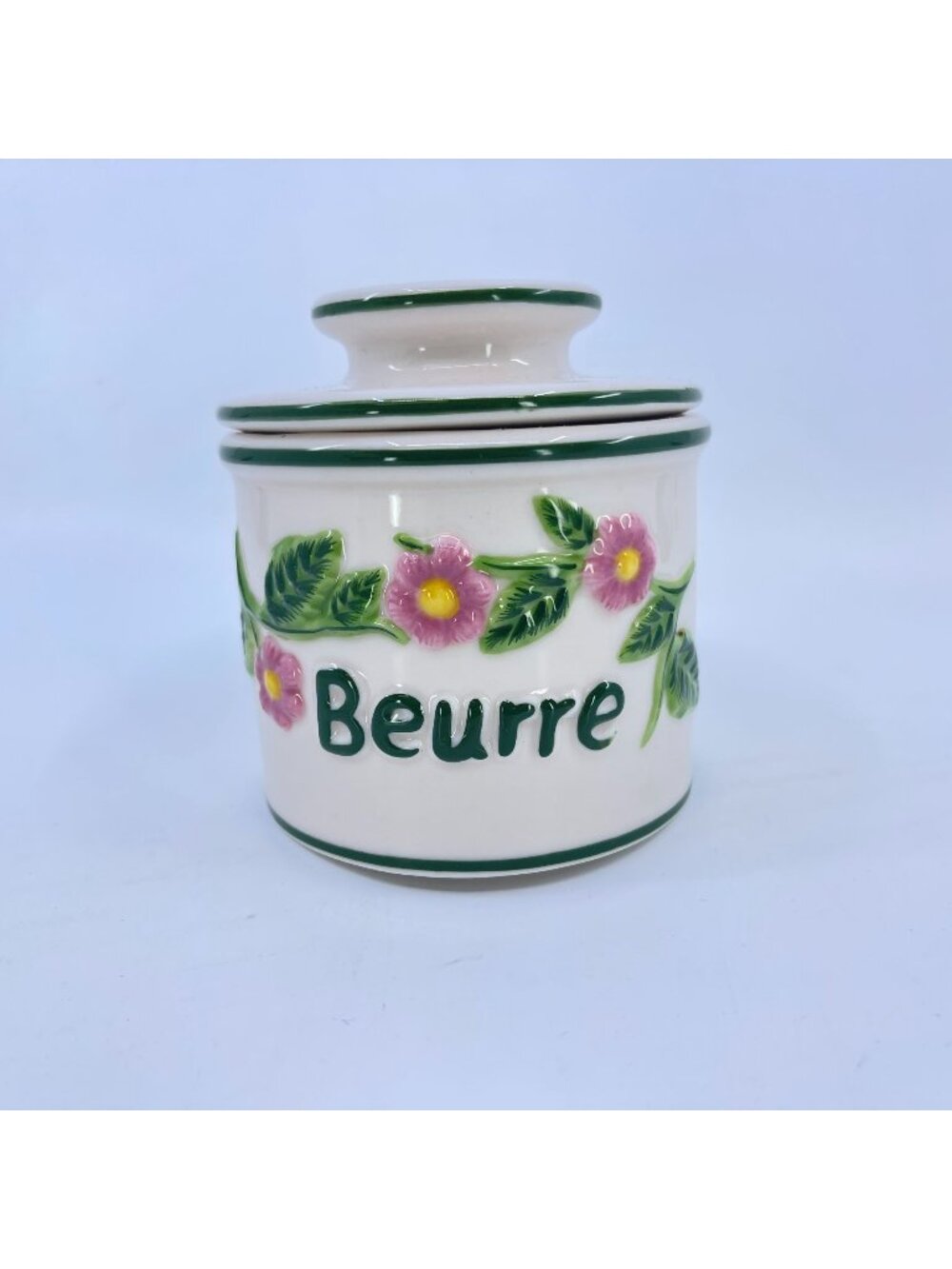 vintage fresh and creamy butter bell with floral embossed design french country